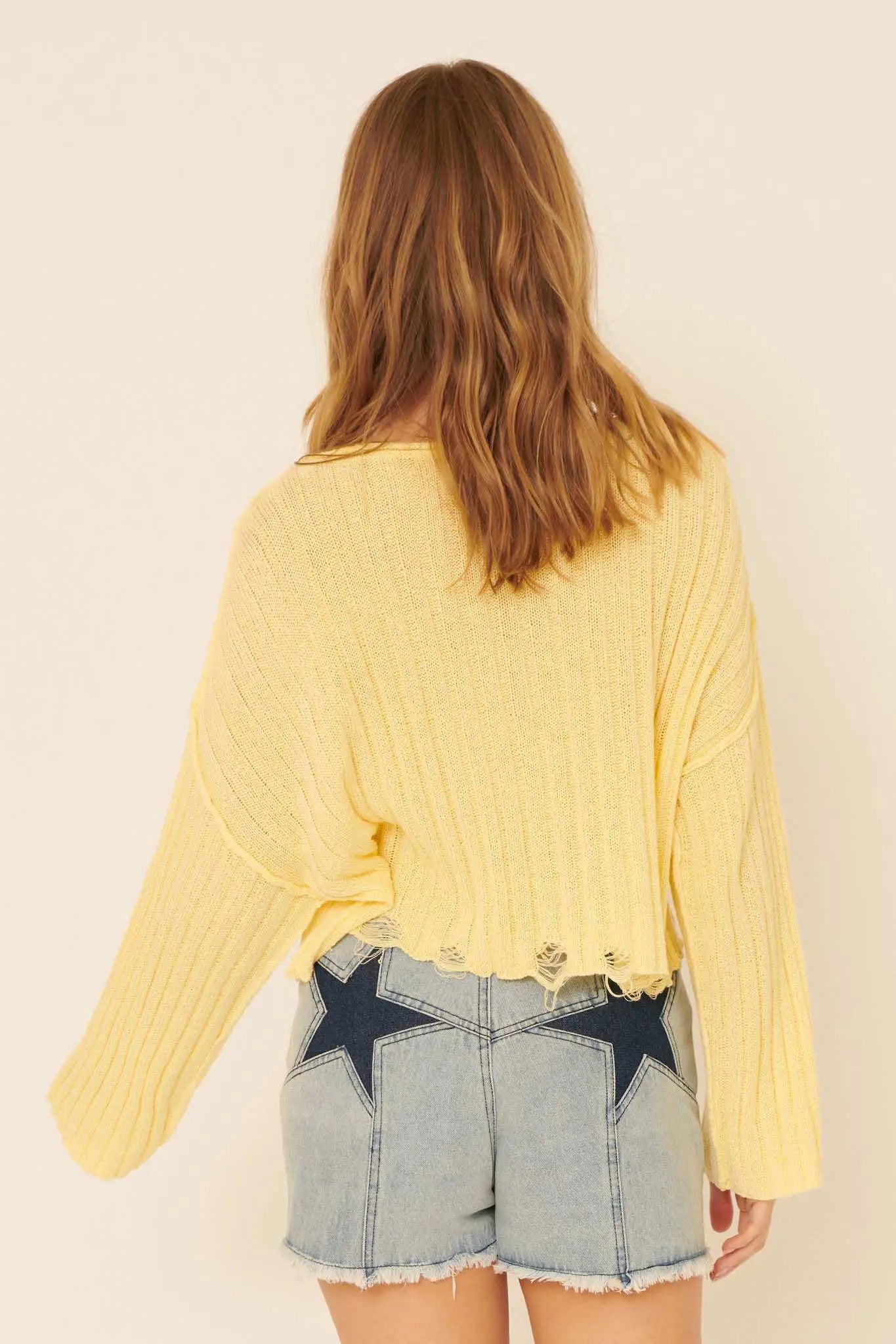 Mad Love Distressed Ribbed Knit Sweater
