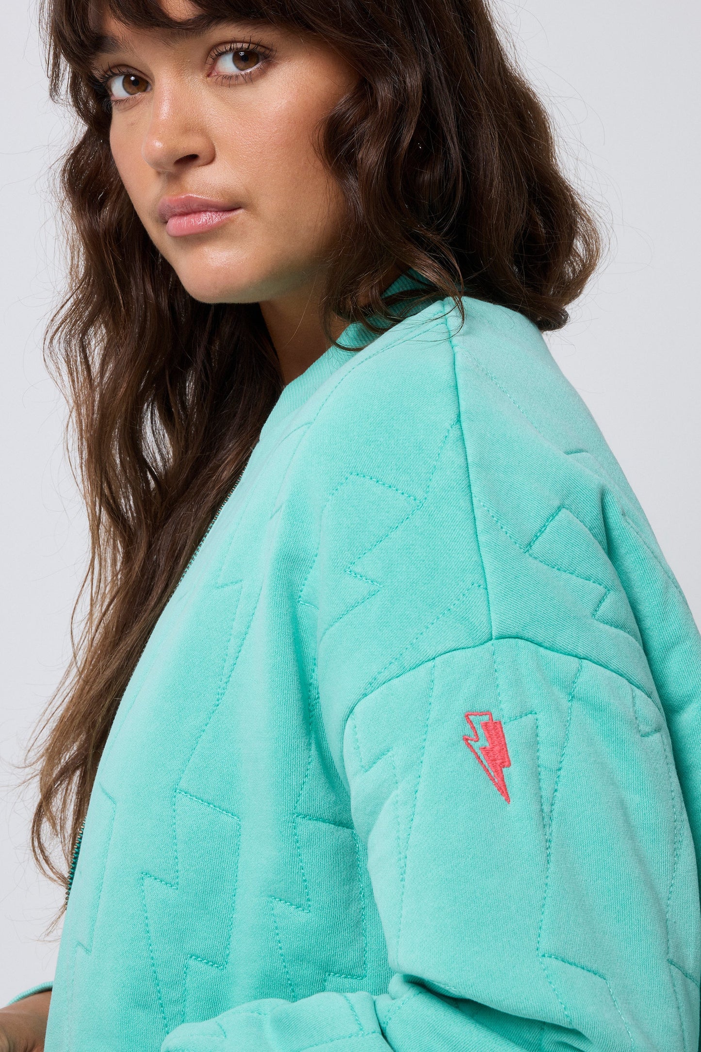 Turquoise Lightning Bolt Oversized Quilted Bomber Jacket