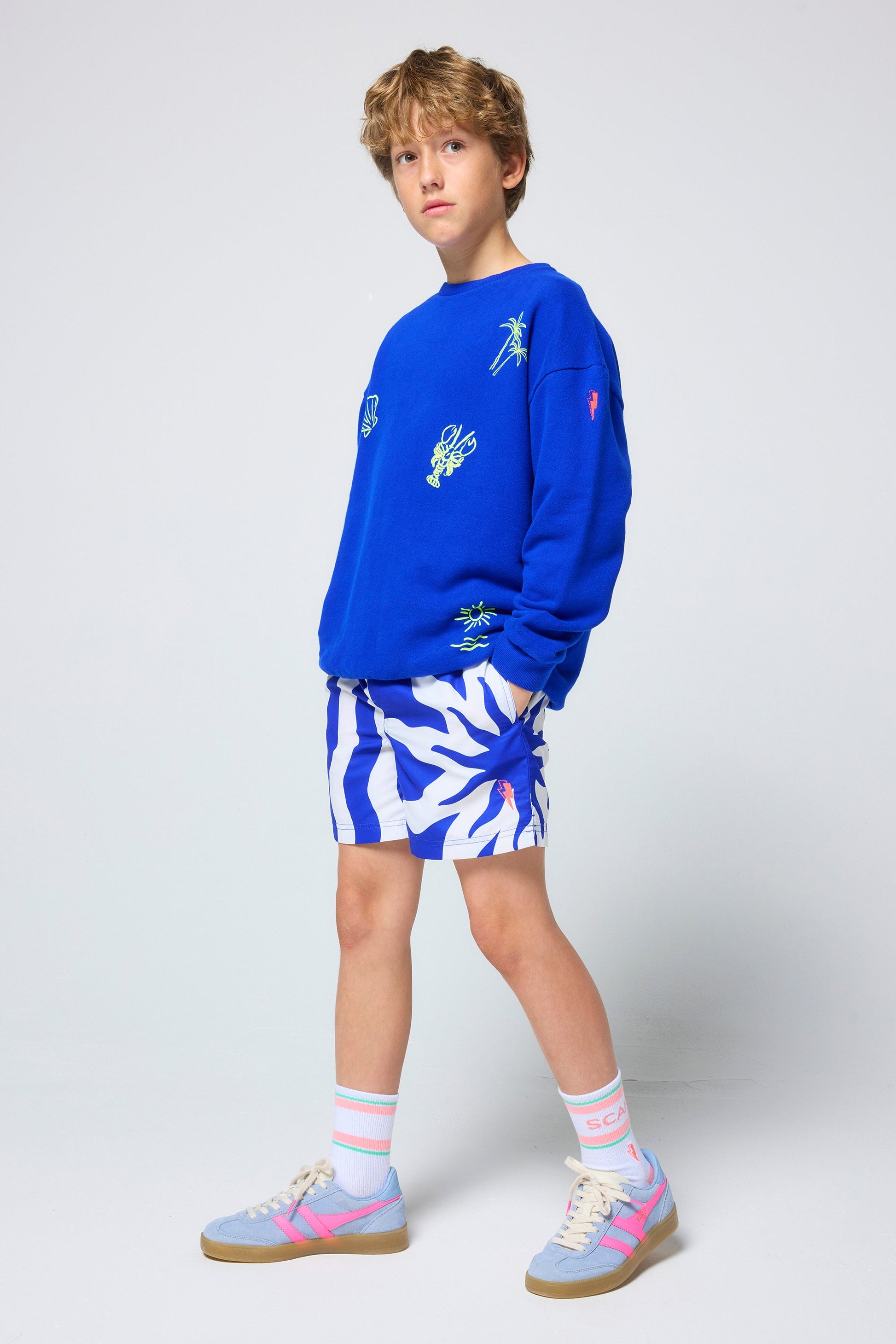 Kids Blue Sunstar and Stripe Swim Shorts