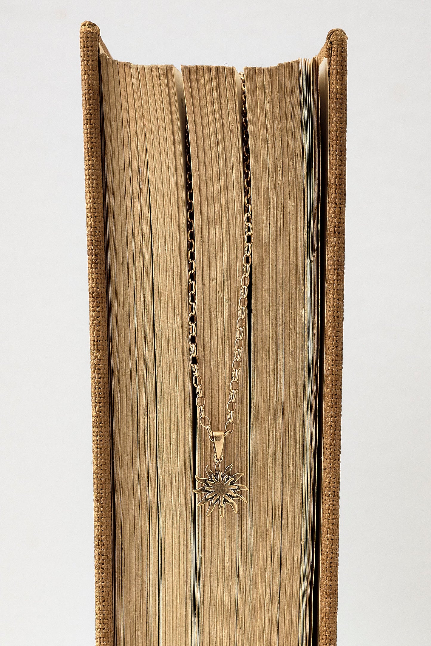 Gold Sunstar Pendant Necklace