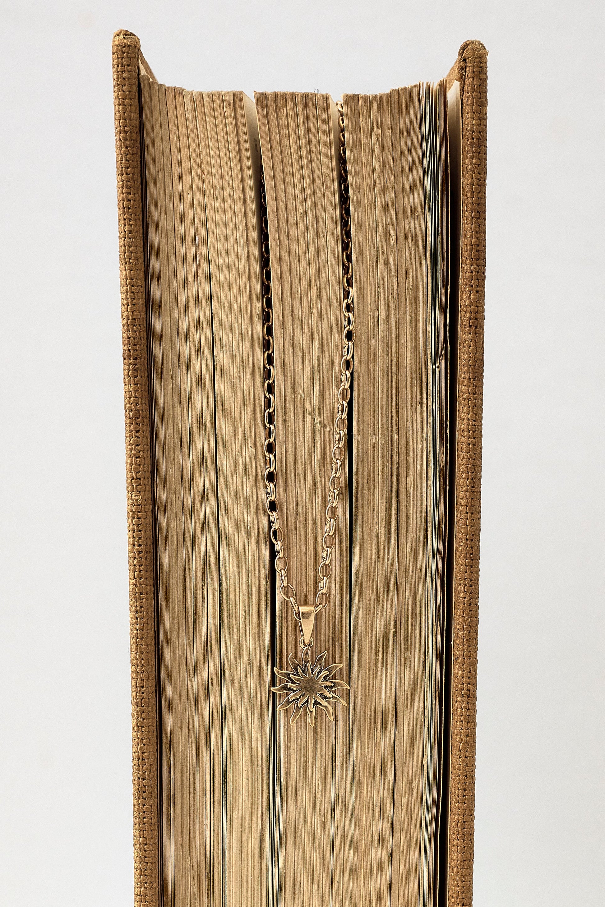 Gold Sunstar Pendant Necklace