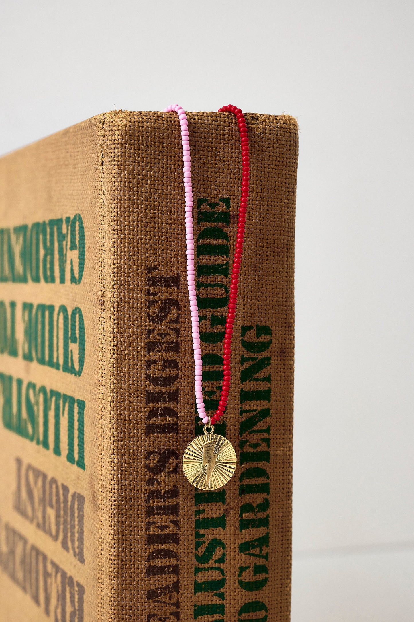 Red and Pink Bead Circle Bolt Necklace