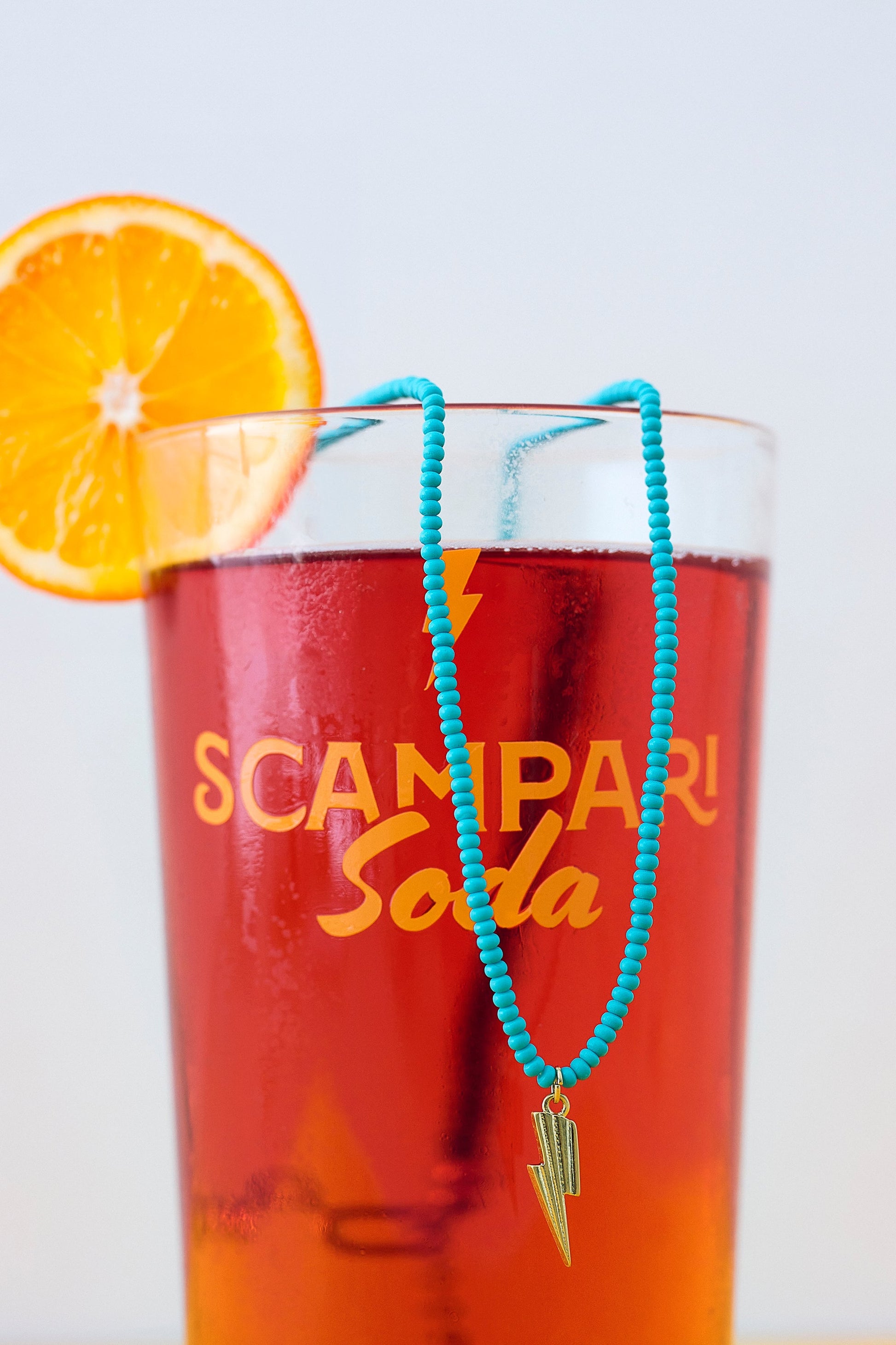 Aqua Bead Gold Bolt Necklace
