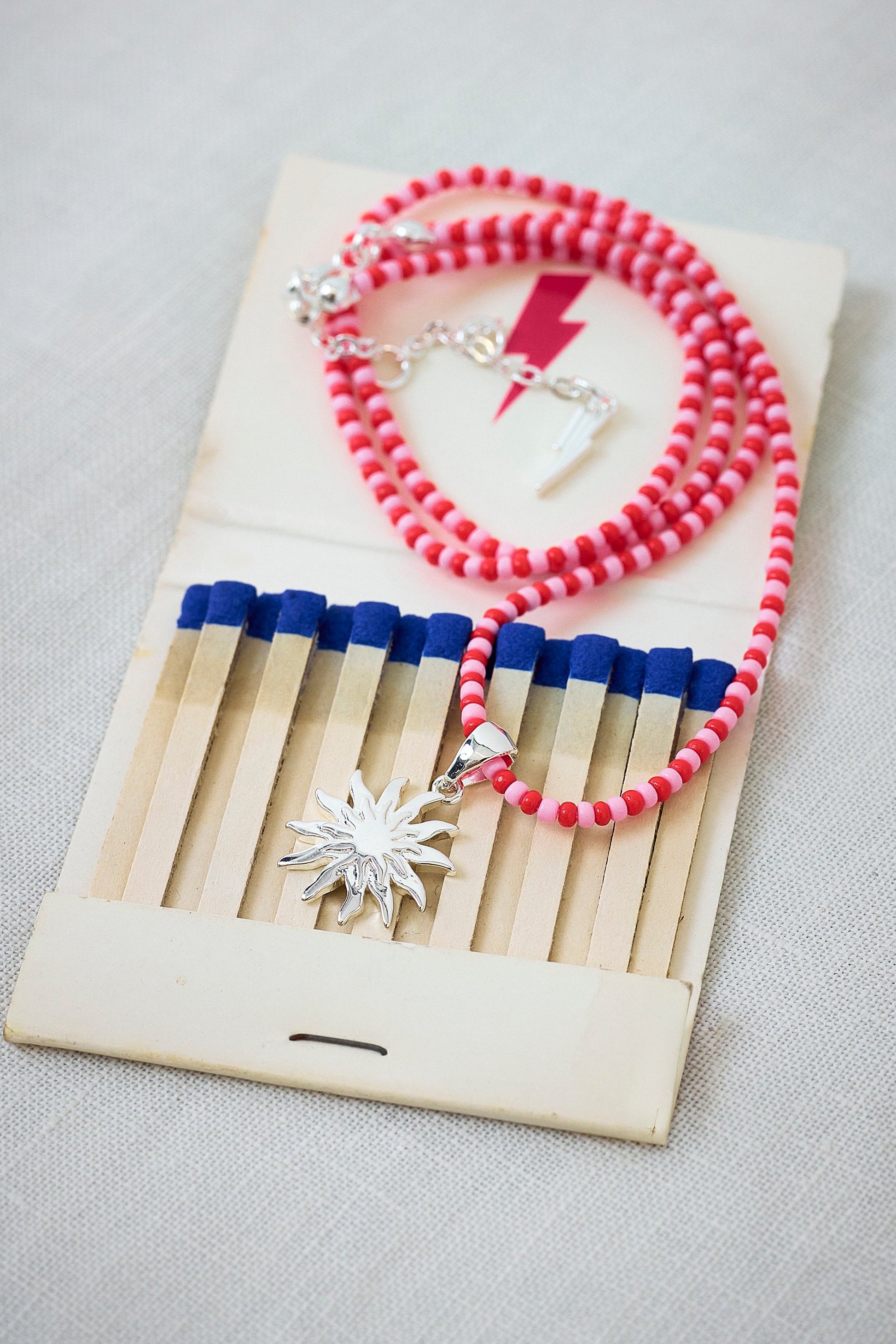Red and Pink Bead Silver Sunstar Necklace