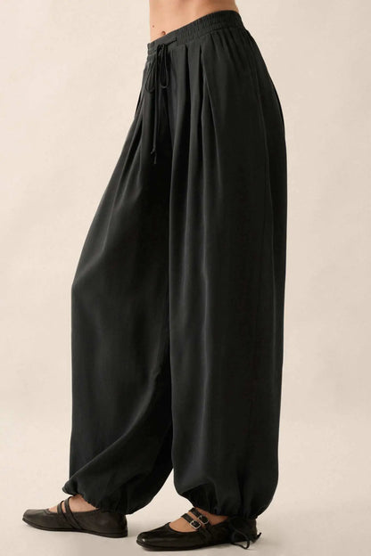 Loosely Translated Pleated Wide-Leg Harem Pants