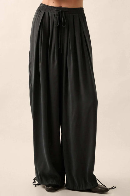 Loosely Translated Pleated Wide-Leg Harem Pants